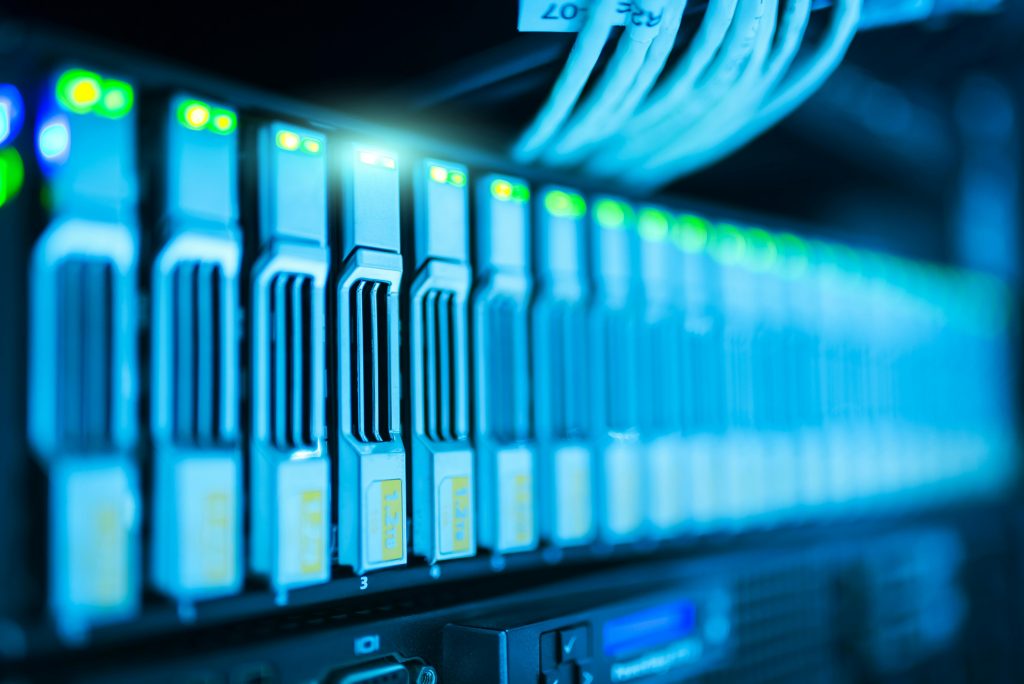 pexels-photo-1148820-1148820 Detailed image of a server rack with glowing lights in a modern data center.